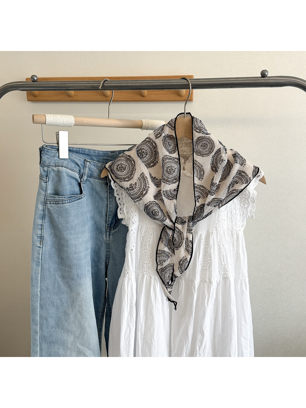 White Medallion triangle scarf tied over a white dress