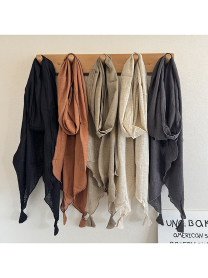 Black, Orange, Khaki, Ivory, and Dark Gray tassel scarves displayed together