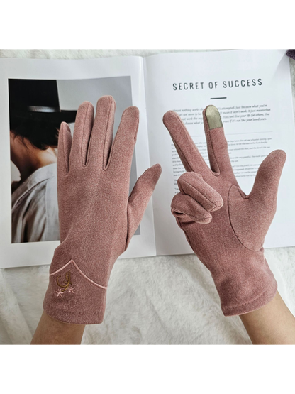 Dusty Pink embroidered gloves worn with one contrasting fingertip panel visible