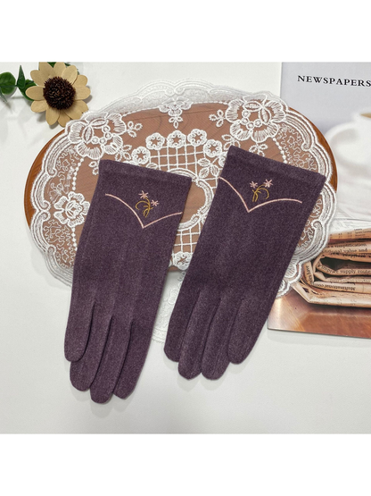 Heather Purple gloves with floral embroidery and a contrasting V-shaped cuff line