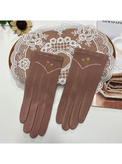 Dusty Pink gloves with floral embroidery and a contrasting V-shaped cuff line
