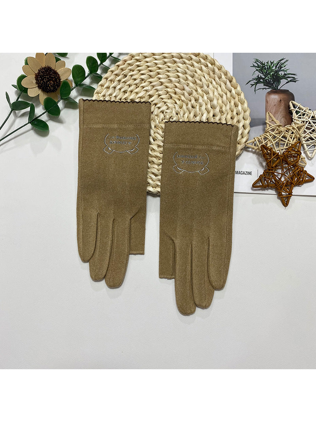 Khaki fingerless gloves with a small embroidered cuff emblem