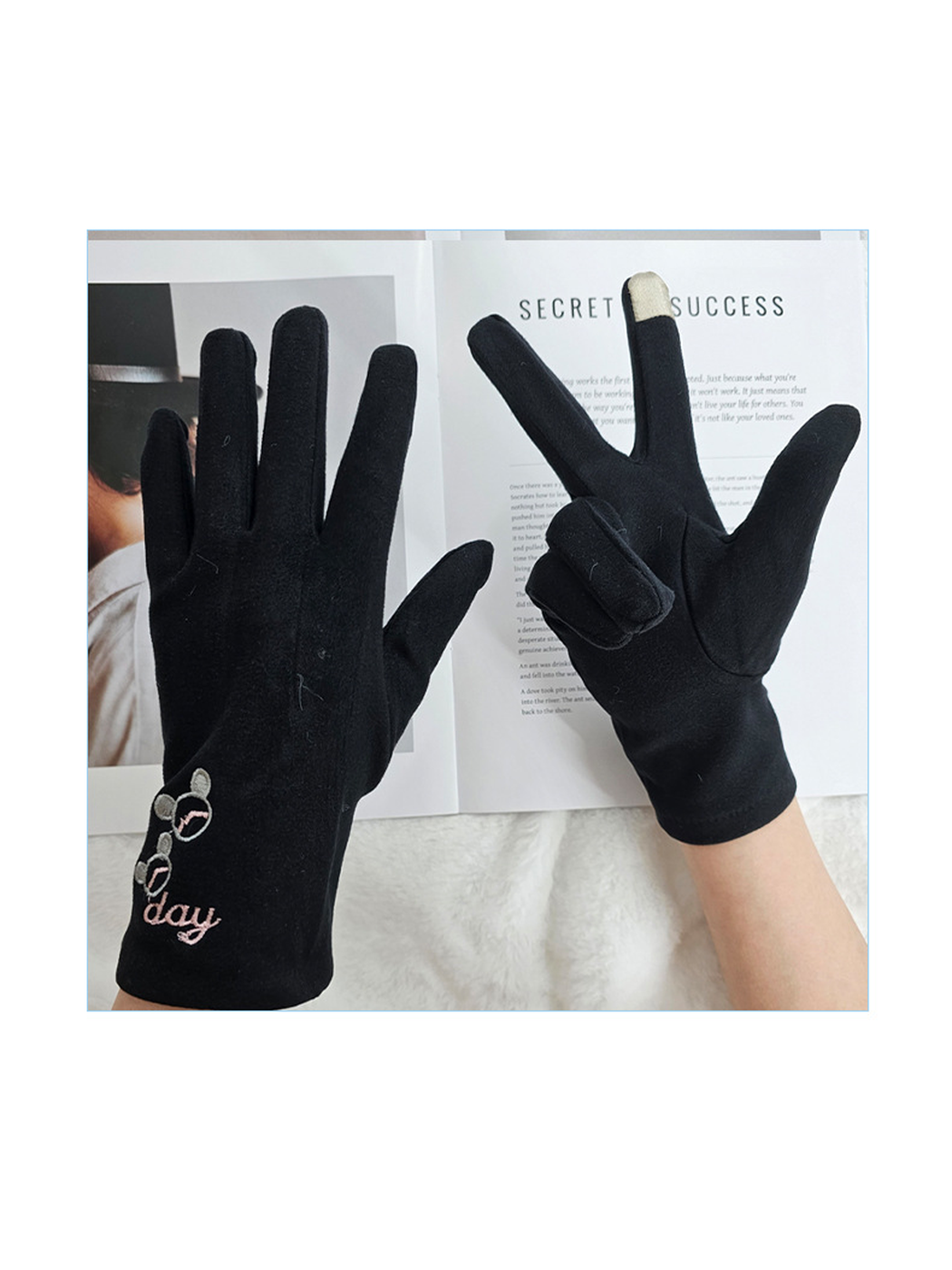 Black gloves worn to show the palm and embroidered back