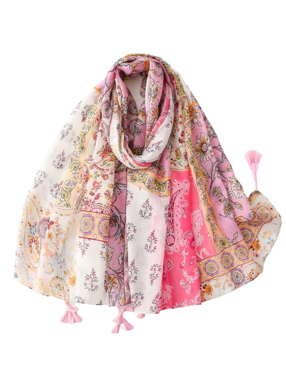 Pink multicolor floral and paisley scarf with tassel edges, draped view