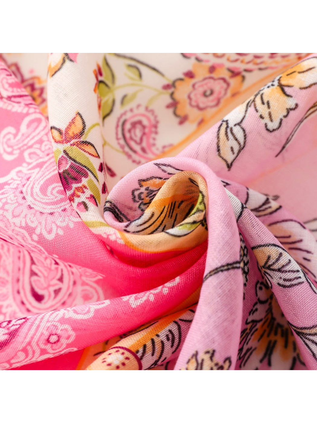 Close-up of the pink floral and paisley print and fine semi-sheer woven-look surface