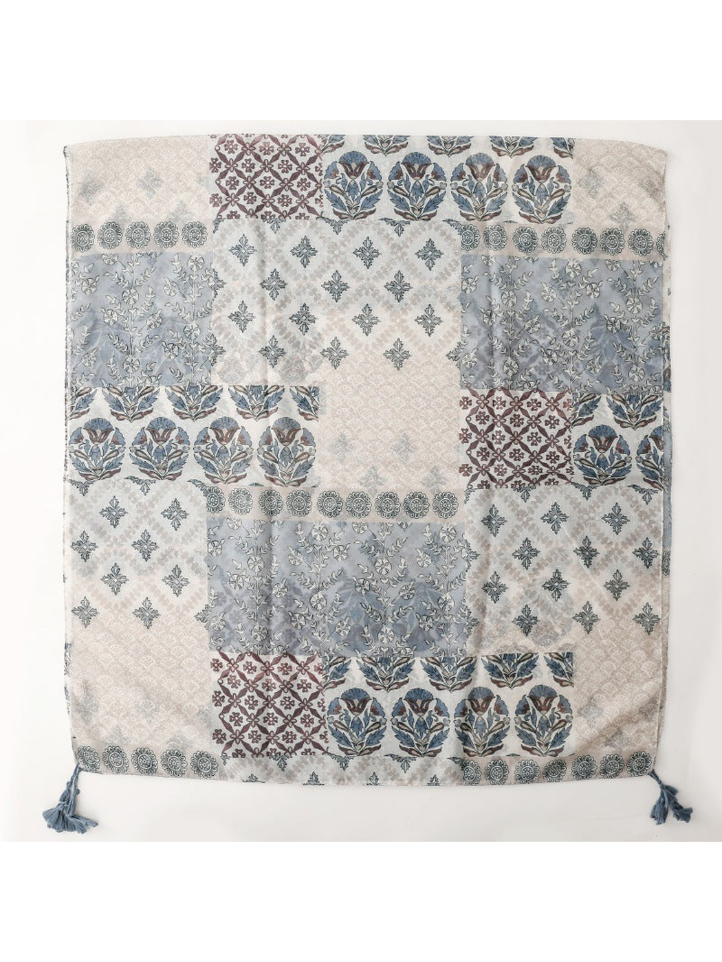 Blue-gray and ivory patchwork floral scarf with tassels, fully spread view