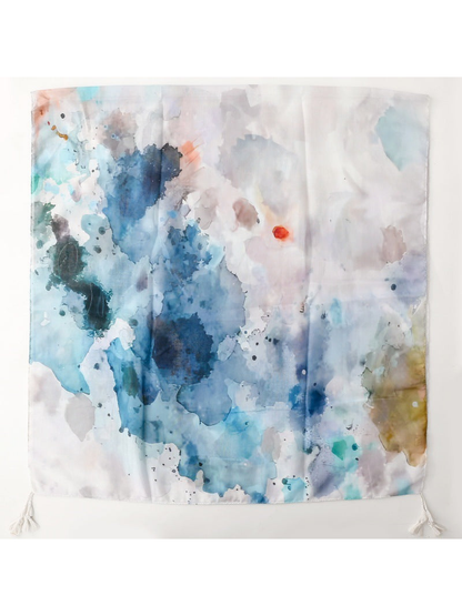 Multicolor rectangular scarf with an abstract watercolor-style pattern and corner tassels