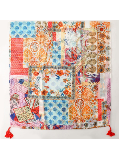 Multicolor patchwork scarf laid flat with floral, geometric and bird motifs