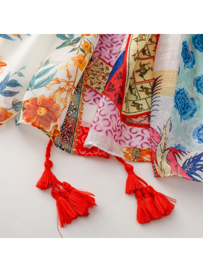 Close-up of the patterned scarf edges and red corner tassels