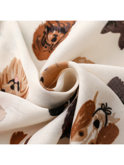 Close-up of the Ivory scarf gathered into soft folds