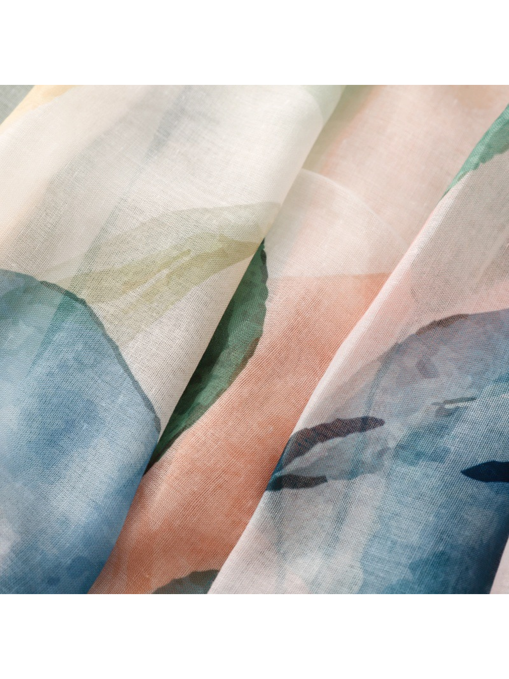 Close-up of blue, green, peach and pink watercolor-style pattern transitions
