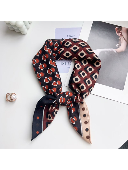 Geometric multicolor square scarf tied in a loop