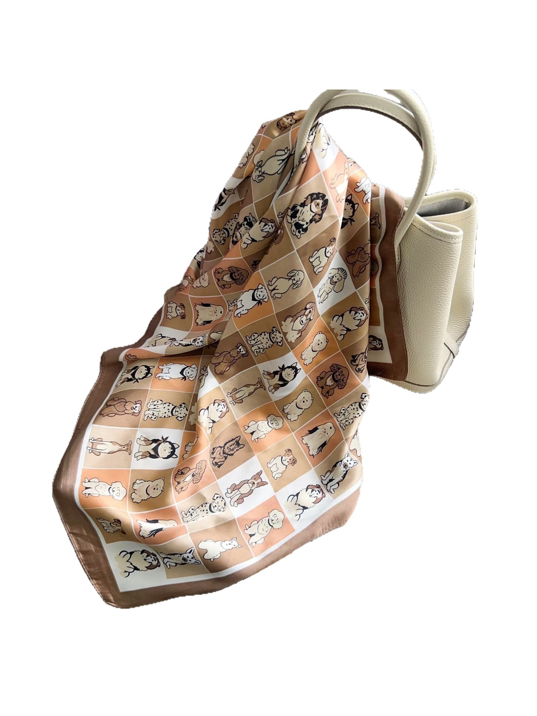 Brown square scarf with tiled dog print draped over a handbag