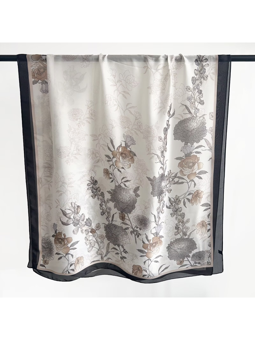 Black Gray floral scarf with contrasting dark border in a full hanging view