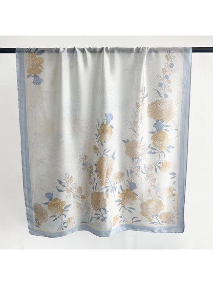 Light Blue floral scarf in a full hanging view showing the border and botanical pattern