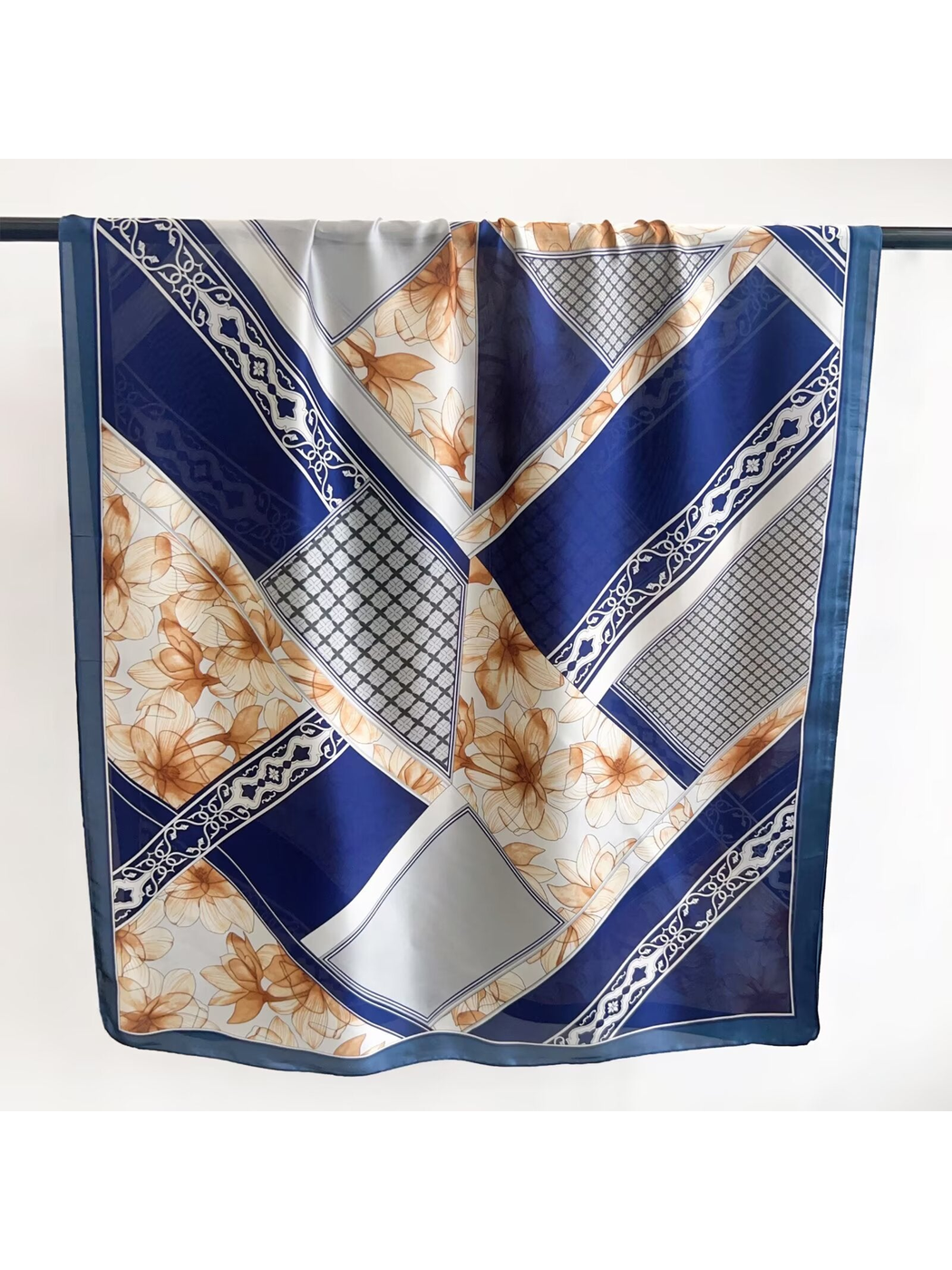 Blue, cream and tan long rectangular scarf with floral and geometric patchwork print