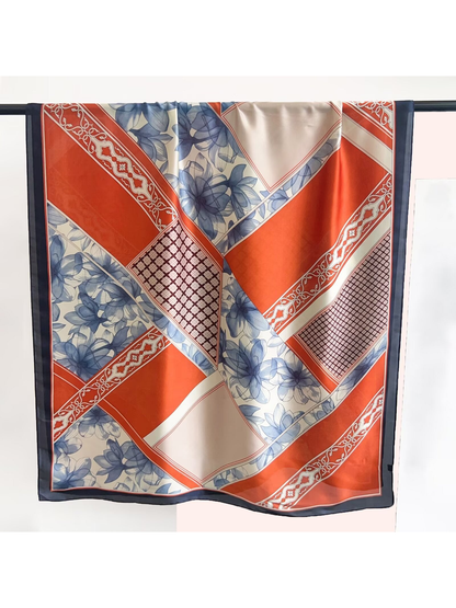 Orange-red, blue and cream long rectangular scarf with floral and geometric patchwork print