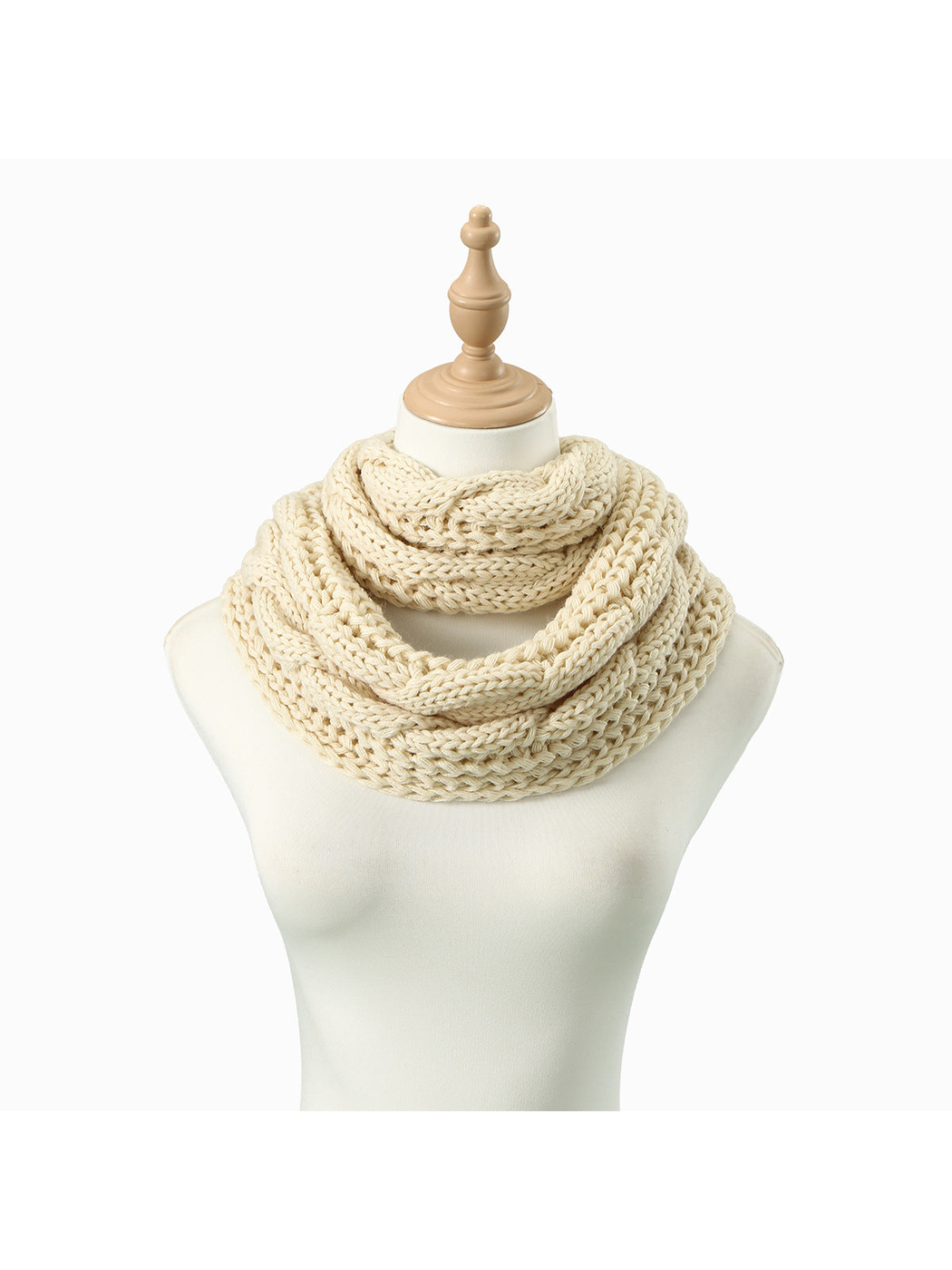 Cream Cable infinity scarf looped on a dress form