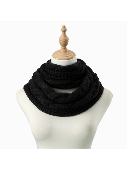 Black Cable infinity scarf looped on a dress form