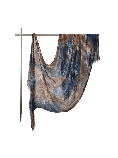 Blue and brown abstract-pattern scarf with fringed ends, full draped view