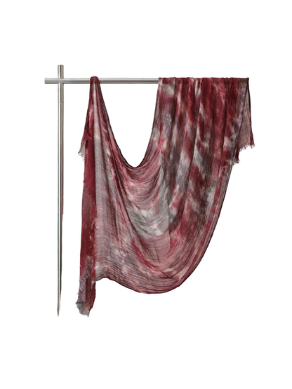 Burgundy abstract-pattern scarf with fringed ends, full draped view