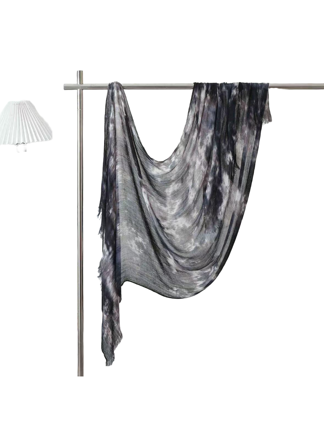 Black and gray abstract-pattern scarf with fringed ends, full draped view