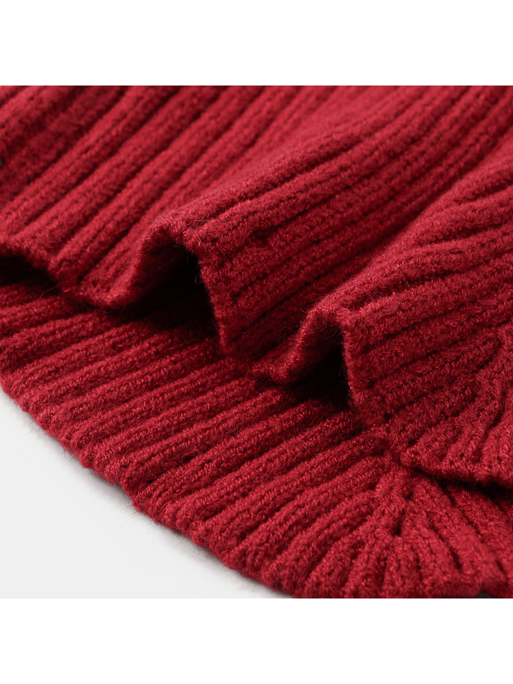 Close-up of Burgundy ribbing and folded edges