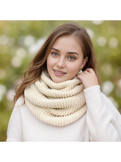 Beige chunky knit infinity scarf worn outdoors