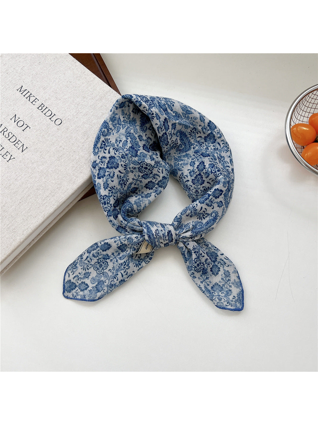 Blue Floral square scarf tied in a loop