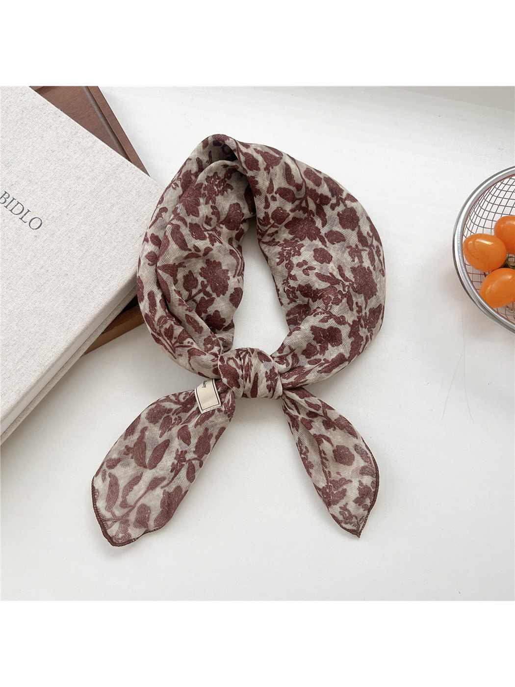 Burgundy Floral square scarf tied in a loop