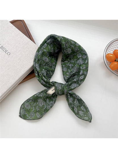 Green Floral square scarf tied in a loop