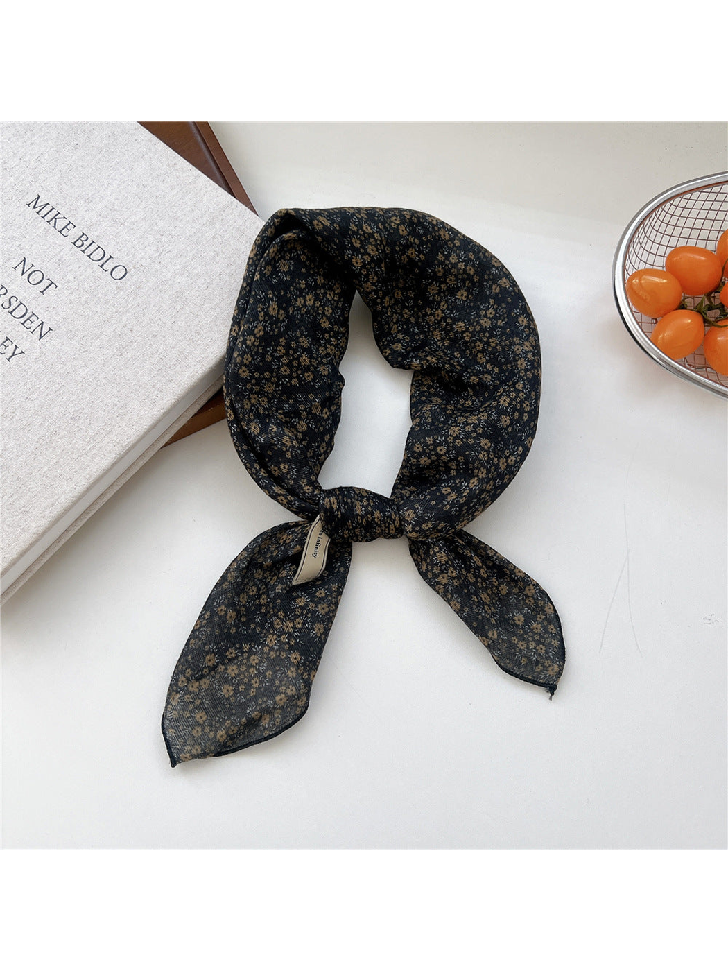 Gold Floral square scarf tied in a loop