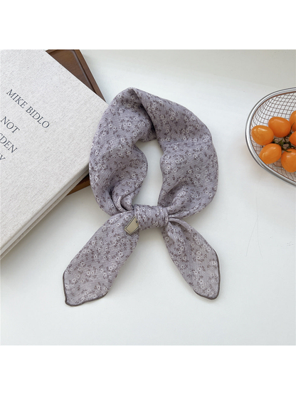 Purple Floral square scarf tied in a loop