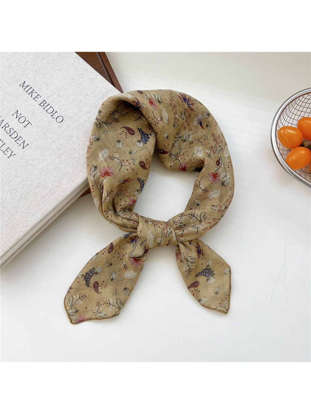 Mustard Leaves square scarf tied in a loop