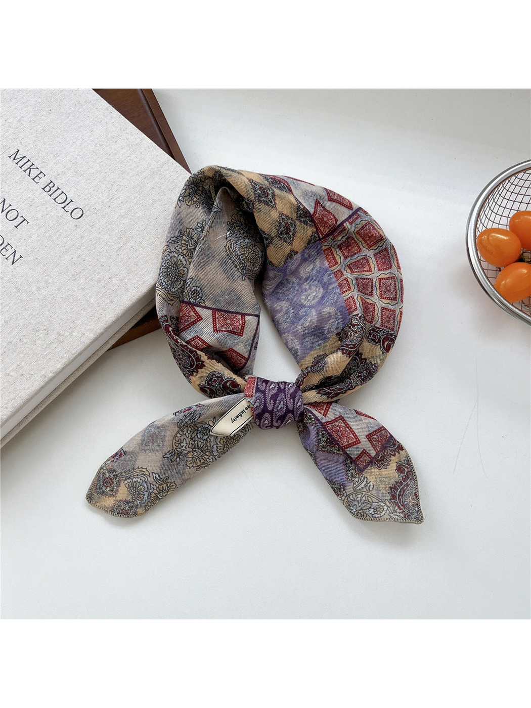 Purple Patchwork square scarf tied in a loop