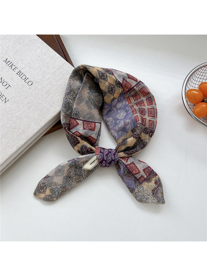 Purple Patchwork square scarf tied in a loop