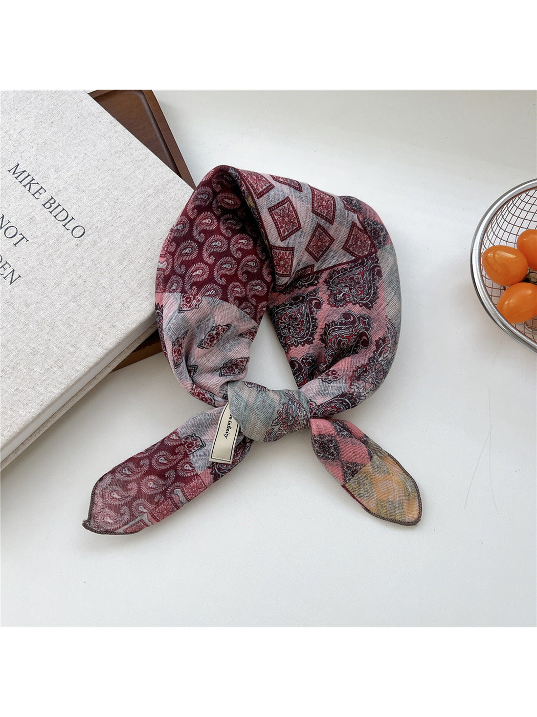 Pink Patchwork square scarf tied in a loop
