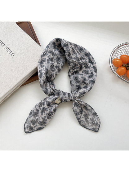 Animal Paisley square scarf tied in a loop
