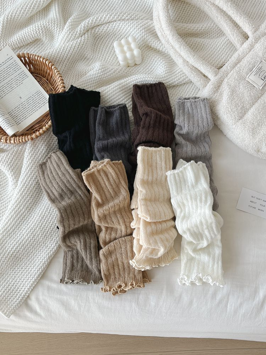 Eight colors of ribbed ruffled leg warmers arranged together