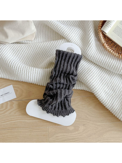 Dark Gray ribbed leg warmers with a ruffled edge