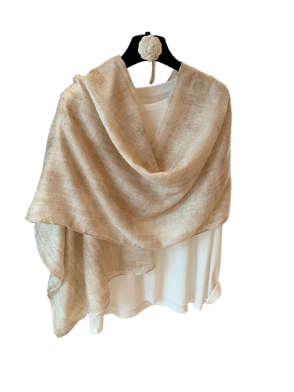 Beige scarf with metallic-look flecks arranged in a loose shoulder drape