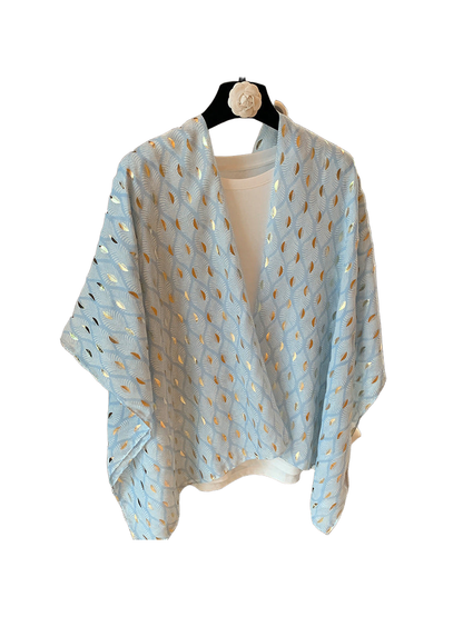 Light Blue scarf hanging open over a white top, showing the full patterned drape