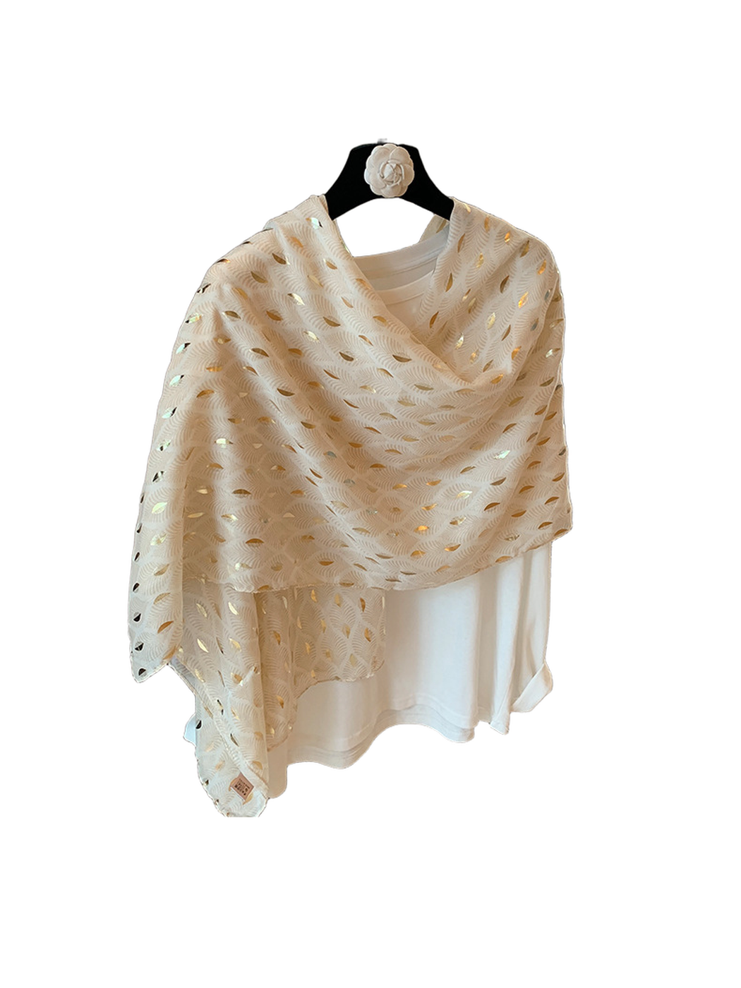 Beige scarf draped around a white top, showing the patterned full length