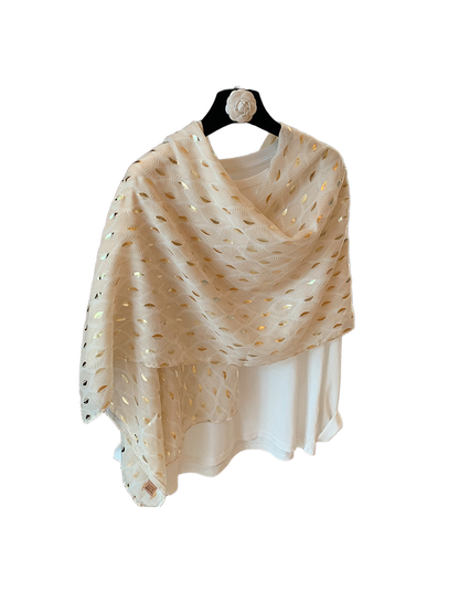 Beige scarf draped around a white top, showing the patterned full length