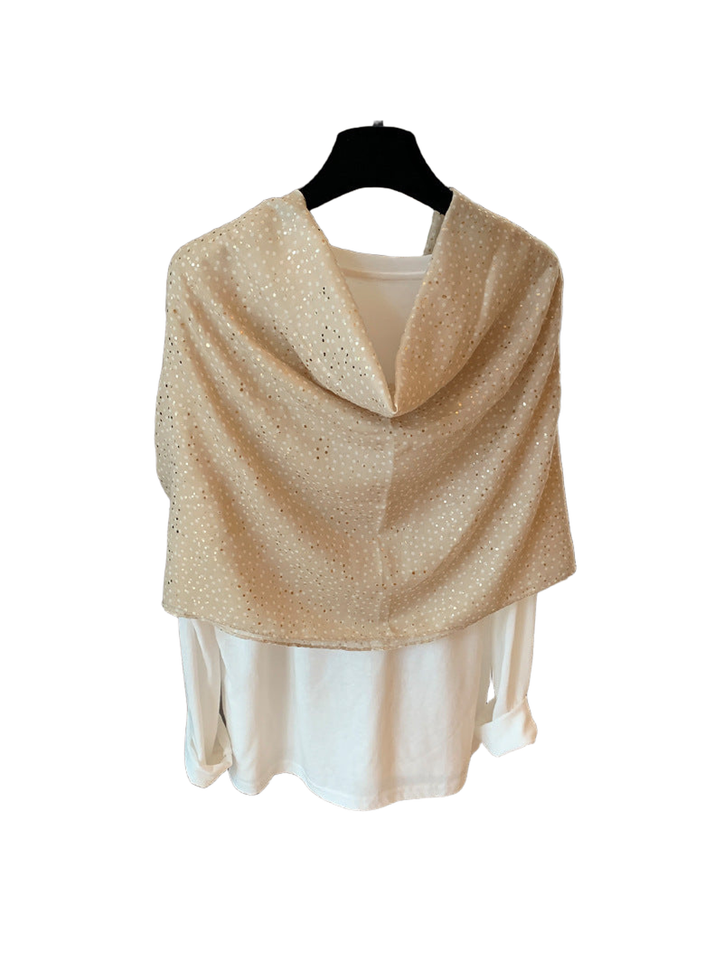 Beige dotted scarf arranged in a wide shoulder-style drape