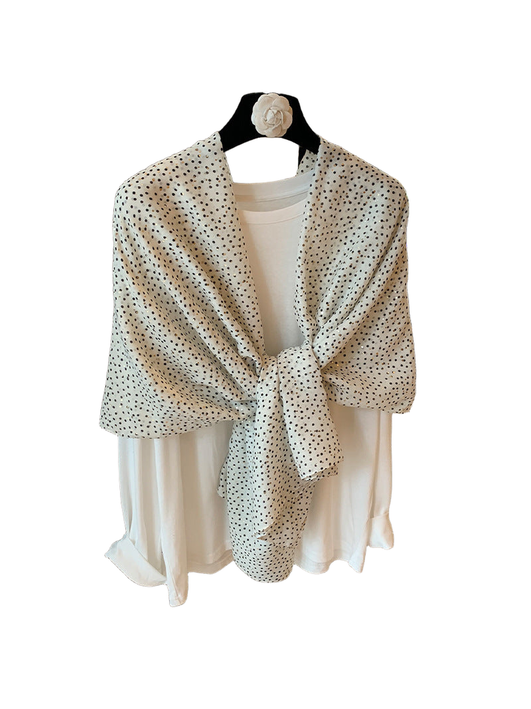Ivory scarf with scattered dark and light dots, knotted front view