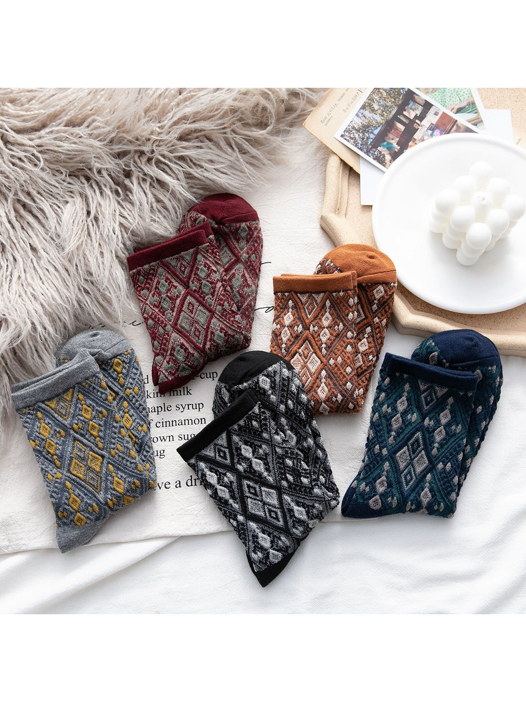 Five diamond-pattern sock styles arranged together