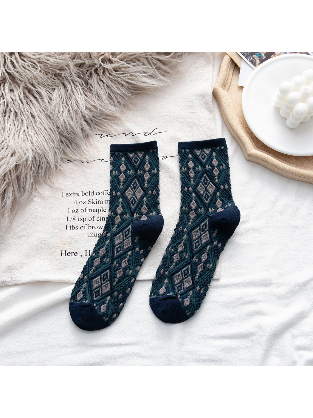 Teal Diamond socks with light geometric motifs