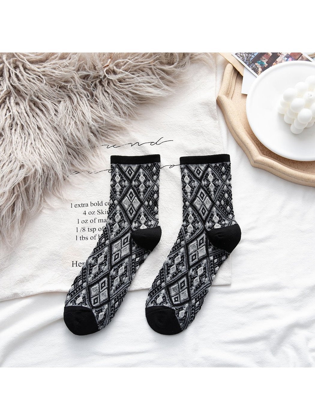 Black Diamond socks with gray geometric motifs