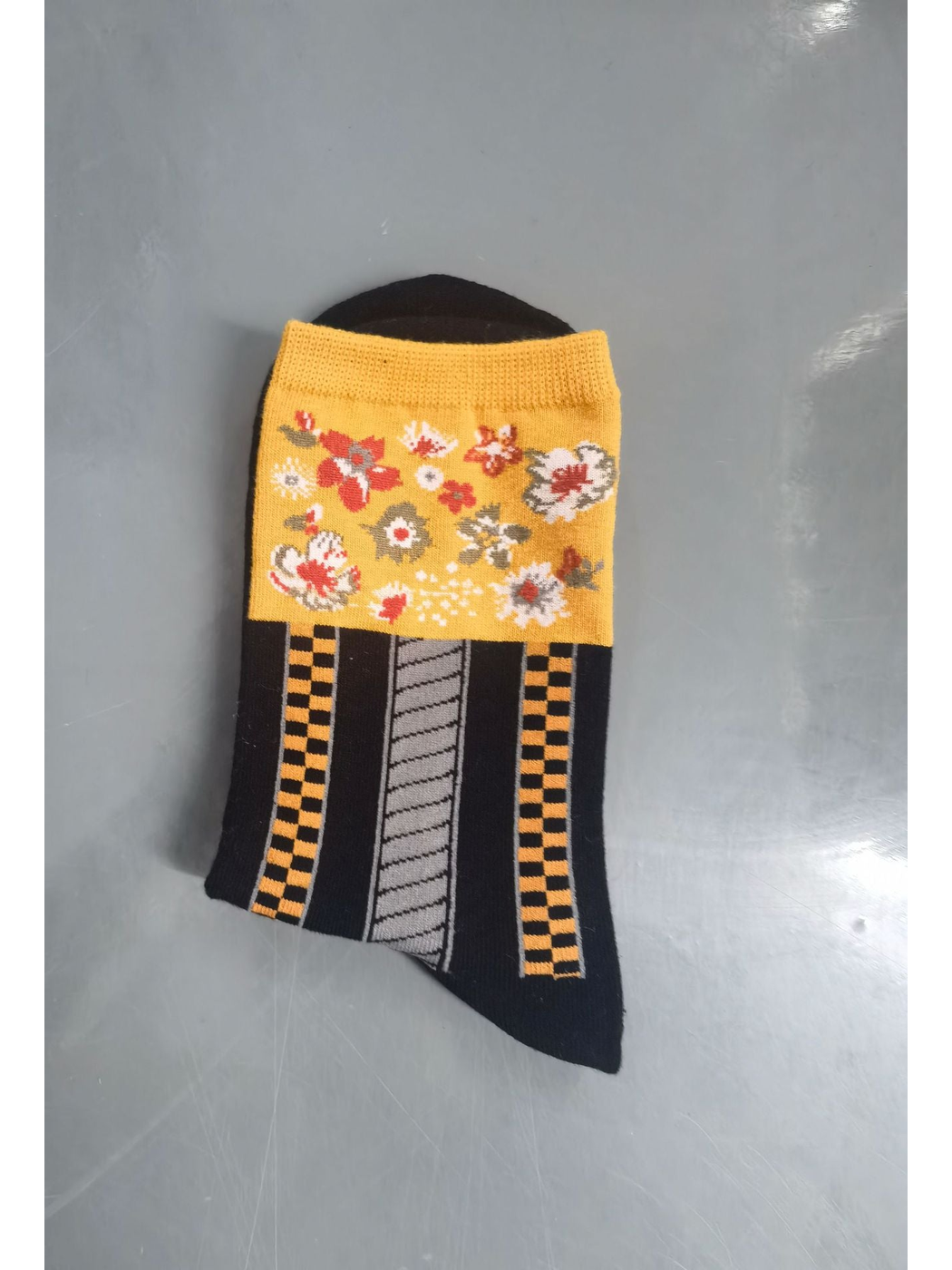 Black Floral socks with yellow floral panels and checker stripes